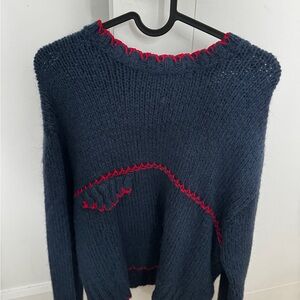 Navy Blue Sweater with Red Accents